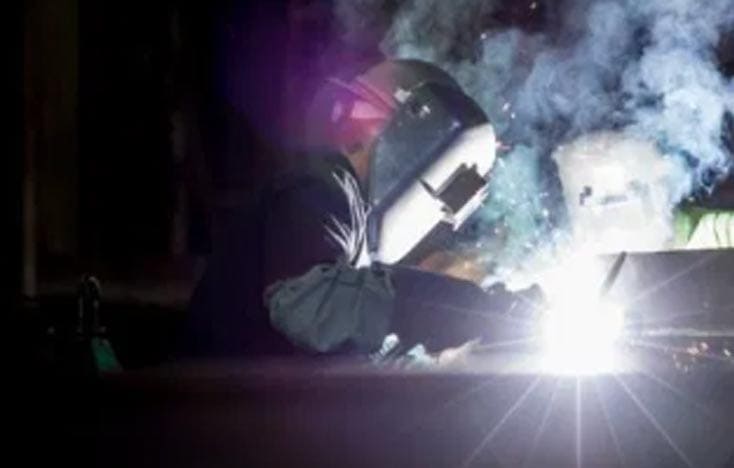 Professional welding process at a construction site